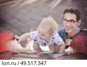 Cheerful, relaxed family having fun on vacation. Стоковое фото, агентство Ingram Publishing / Фотобанк Лори