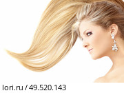Profile of lying beauty with the smart hair, isolated. Стоковое фото, агентство Ingram Publishing / Фотобанк Лори