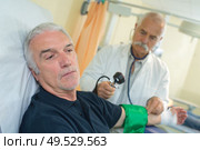 a patient during blood transfusion. Стоковое фото, агентство Ingram Publishing / Фотобанк Лори