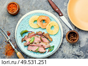 Baked duck meat with pineapple sauce.Fried duck breast. Roasted duck with ananas. Стоковое фото, агентство Ingram Publishing / Фотобанк Лори