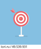 Arrow in target, vector isolated on blue. Accuracy concept, dartboard with dart in center. Business solutions symbol, efficiency and bullseye in red and white. Arrow in Target, Vector Isolated. Accuracy Concept. Стоковая иллюстрация, агентство Ingram Publishing / Фотобанк Лори