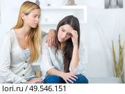girl helping her sad sister with problems. Стоковое фото, агентство Ingram Publishing / Фотобанк Лори
