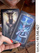 october 29, 2019 - SAINT PETERBURG, RUSSIA:Tarot by Barbieri. Divination set up. Imperor and Priestess. close up. Редакционное фото, агентство Ingram Publishing / Фотобанк Лори