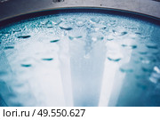 Abstract image of raindrops over a glass. Стоковое фото, агентство Ingram Publishing / Фотобанк Лори