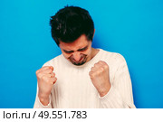 Man shows tongue. Стоковое фото, агентство Ingram Publishing / Фотобанк Лори