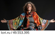 A woman in a wheelchair with her arms extended outward. Стоковое AI-изображение, AI-художник Данила Большаков / Фотобанк Лори