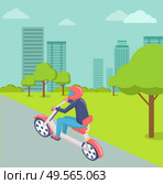 Male riding motorbike vector, biker on vehicle in city flat style street with trees and lawns, skyscrapers, motorcyclist man commuting to downtown. Motorbike Rider in City, Modern Town Cityscape. Стоковая иллюстрация, агентство Ingram Publishing / Фотобанк Лори