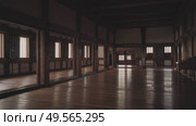 Himeji, Japan - Sep 24 2024, 4k, panoramic view of room with sunlight passes through window and leaves a beautiful lattice print on floor, inside Himeji Castle, White Heron castle, Himeji, Japan. Редакционное видео, видеограф Сергей Богомяко / Фотобанк Лори