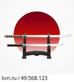 Japanese culture history with matched pair traditional swords against red circle white background flag realistic vector illustration. Стоковая иллюстрация, агентство Ingram Publishing / Фотобанк Лори