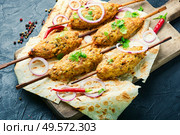 Minced meat skewers or lula kebab.Grilled lula kebab lamb.Asian traditional meat dish. Traditional middle eastern kebab. Стоковое фото, агентство Ingram Publishing / Фотобанк Лори