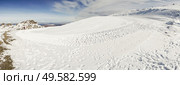 Spain, Andalusia, Granada. Panoramic view of ski resort of Sierra Nevada in winter, full of snow. Travel and sports concepts.. Ski resort of Sierra Nevada in winter, full of snow. Стоковое фото, агентство Ingram Publishing / Фотобанк Лори