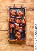 Turkish or arabic tradition liver kebab on skewers.Ciger kebab. Grilled beef liver kebabs. Стоковое фото, агентство Ingram Publishing / Фотобанк Лори