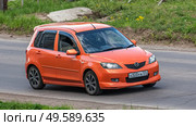 Автомобиль mazda demio. Редакционное фото, фотограф Анатолий Володин / Фотобанк Лори