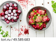 Delicious kufta or lamb meatballs in cherry sauce. Syrian kyufta with cherry. Стоковое фото, агентство Ingram Publishing / Фотобанк Лори