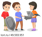 School history club for pupils. Three kids playing historical scene about knights. Children have armor and helmet for installation. Vector illustration in flat cartoon style. School History Club, Children Doing Installation. Стоковая иллюстрация, агентство Ingram Publishing / Фотобанк Лори