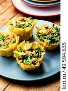 Appetizing cheese basket with avocado,cowpea and nuts.Banquet,holiday food. Cheese basket stuffed with vegetables. Стоковое фото, агентство Ingram Publishing / Фотобанк Лори