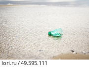 Plastic and microplastic in the sand beach. Стоковое фото, агентство Ingram Publishing / Фотобанк Лори