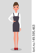 Beautiful young slender businesswoman stands in strict black dress and white classic blouse, red shoes, a strict hairstyle. Female character. Business style. Confident female flat vector illustrations. Presentation woman, college student or successful businesswoman. Female adult modern character. Стоковая иллюстрация, агентство Ingram Publishing / Фотобанк Лори