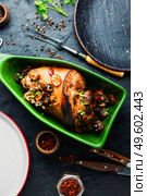 German cuisine meat dish of pork leg and pork knuckle.. Roasted pork knuckle or eisbein. Стоковое фото, агентство Ingram Publishing / Фотобанк Лори