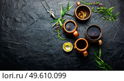 Cup of herbal tea on the table. Ivan tea or fireweed.Herbal medicine.Copy space. Aromatic fireweed tea,space for text. Стоковое фото, агентство Ingram Publishing / Фотобанк Лори