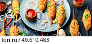 Lula kebab, minced meat skewered and grilled on charcoal. lula kebab on a skewer. Стоковое фото, агентство Ingram Publishing / Фотобанк Лори