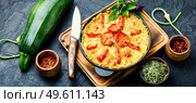 Appetizing vegetable casserole with zucchini and tomato.Summer food. Zucchini vegetable casserole. Стоковое фото, агентство Ingram Publishing / Фотобанк Лори