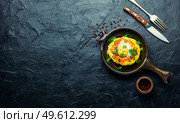 Squash stuffed with couscous and mushrooms. Baked patisson with shakshuka.Patty pan squash.Copy space. Baked stuffed squash or patisson. Стоковое фото, агентство Ingram Publishing / Фотобанк Лори