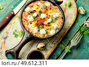 Shakshuka, Israeli cuisine,mix of tomato sauce, fried with hot peppers, spices, minced meat and eggs.Scrambled eggs. Israeli shakshuka, arabic cuisine. Стоковое фото, агентство Ingram Publishing / Фотобанк Лори