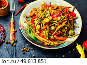 Spicy vegetable appetizer made from pepper, asparagus beans, tomato and capers. Spicy vegetable appetizer. Стоковое фото, агентство Ingram Publishing / Фотобанк Лори