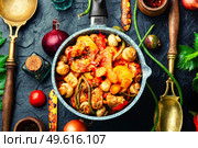Meat ragout with mushrooms, zucchini, tomato and potatoes. Roast meat. Stew with meat and vegetables. Стоковое фото, агентство Ingram Publishing / Фотобанк Лори