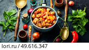Gravy with meat,mushrooms,zucchini and potatoes.Stew meat in stewpan. Ragout with meat and vegetables. Стоковое фото, агентство Ingram Publishing / Фотобанк Лори