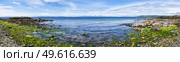 Panoramic view from Ronachan Beach, Kintyre off the West coast of Scotland looking towards Isle of Gigha. Стоковое фото, агентство Ingram Publishing / Фотобанк Лори