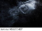Космическая пыль и частицы в темноте. Стоковое AI-изображение, AI-художник Александр Жуков / Фотобанк Лори