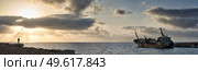 Panoramic photograph of the Edro Shipwreck in the Mediterranean sea, Coral Bay, Cyprus at sunset. Стоковое фото, агентство Ingram Publishing / Фотобанк Лори