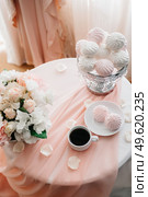 cappuccino on the background of painted tablecloths. Стоковое фото, агентство Ingram Publishing / Фотобанк Лори