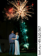 fiery pieces of a fire show against a dark sky and thunderstorms. Стоковое фото, агентство Ingram Publishing / Фотобанк Лори