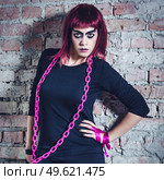 girl model in black with pink hair in an abandoned building. Стоковое фото, агентство Ingram Publishing / Фотобанк Лори