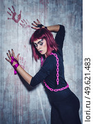 girl model in black with pink hair in an abandoned building. Стоковое фото, агентство Ingram Publishing / Фотобанк Лори