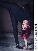 girl model in black with pink hair in an abandoned building. Стоковое фото, агентство Ingram Publishing / Фотобанк Лори