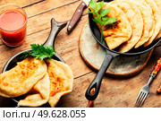 Cheburek, popular and traditional dish of Greek and Tatar cuisine. Fried pies. Non-yeast dough pies with meat filling. Стоковое фото, агентство Ingram Publishing / Фотобанк Лори