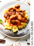 Appetizing beef stroganoff meat. Meat with mushrooms and mashed potatoes. Delicious beef stroganoff meat. Стоковое фото, агентство Ingram Publishing / Фотобанк Лори