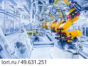 robotic arms in a car plant. robots in a car plant. Стоковое фото, агентство Ingram Publishing / Фотобанк Лори