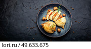 Roast squid stuffed with mushrooms and peppers. Grilled seafood, copy space. Grilled squid with mushroom, space for text. Стоковое фото, агентство Ingram Publishing / Фотобанк Лори