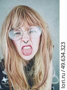 Fresh portrait of a young woman with uncombed hair. Стоковое фото, агентство Ingram Publishing / Фотобанк Лори