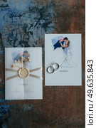 gold wedding rings with a wedding decor. Стоковое фото, агентство Ingram Publishing / Фотобанк Лори