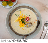 Latin American peanut soup sopa de mani with condiments. Стоковое фото, фотограф Яков Филимонов / Фотобанк Лори