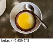 Clay pot contains fermented milk curd with honey. Стоковое фото, фотограф Яков Филимонов / Фотобанк Лори