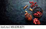Young grape wine in a beautiful vessel.Beautiful wine flask. Stylish barrel of wine. Стоковое фото, агентство Ingram Publishing / Фотобанк Лори