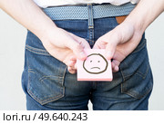 concept of hemorrhoids or diarrhea man deseas. concept of hemorrhoids or diarrhea. Стоковое фото, агентство Ingram Publishing / Фотобанк Лори