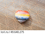 Gemstones minerals chakra stones in the shape of heart. Magic healing Rock for Reiki Crystal Ritual, Witchcraft, spiritual esoteric practice. Healing crystals on brown background. Стоковое фото, агентство Ingram Publishing / Фотобанк Лори